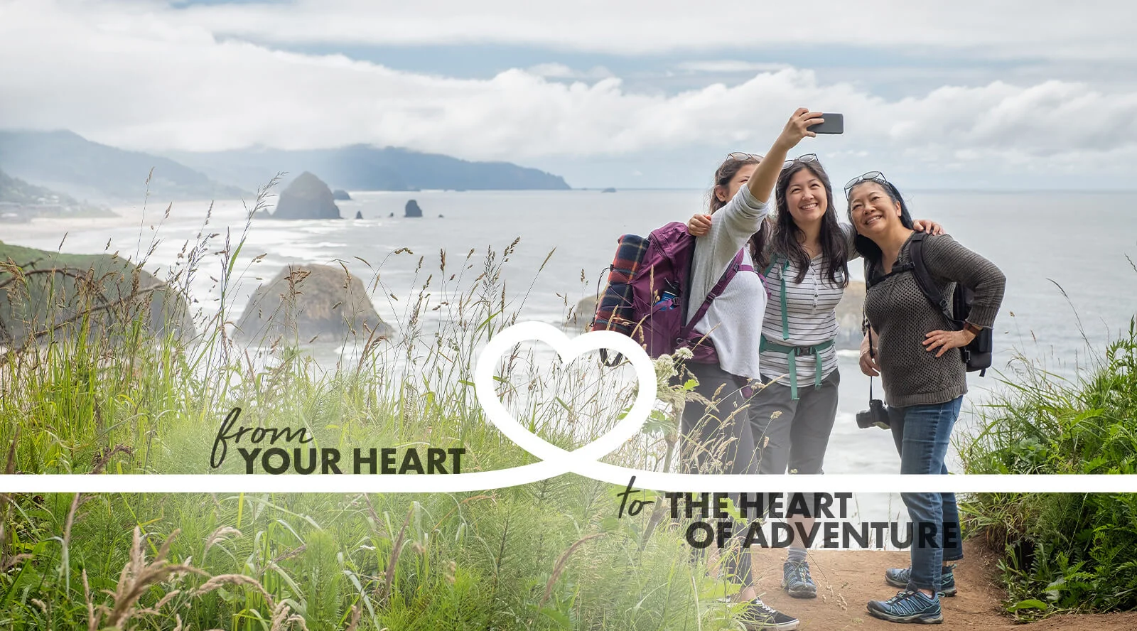 A photo of three women wearing backpacks taking a selfie in front of a sea shore, with the caption from your heart to the heart of adventure