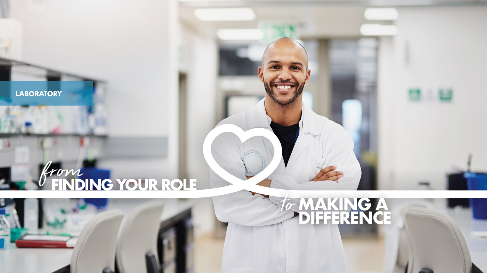 A smiling man in a white lab coat stands with arms crossed in a laboratory; text reads "from finding your role to making a difference.